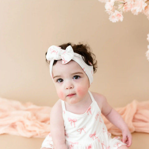 Spaghetti Strap Ruffle Romper in Bow