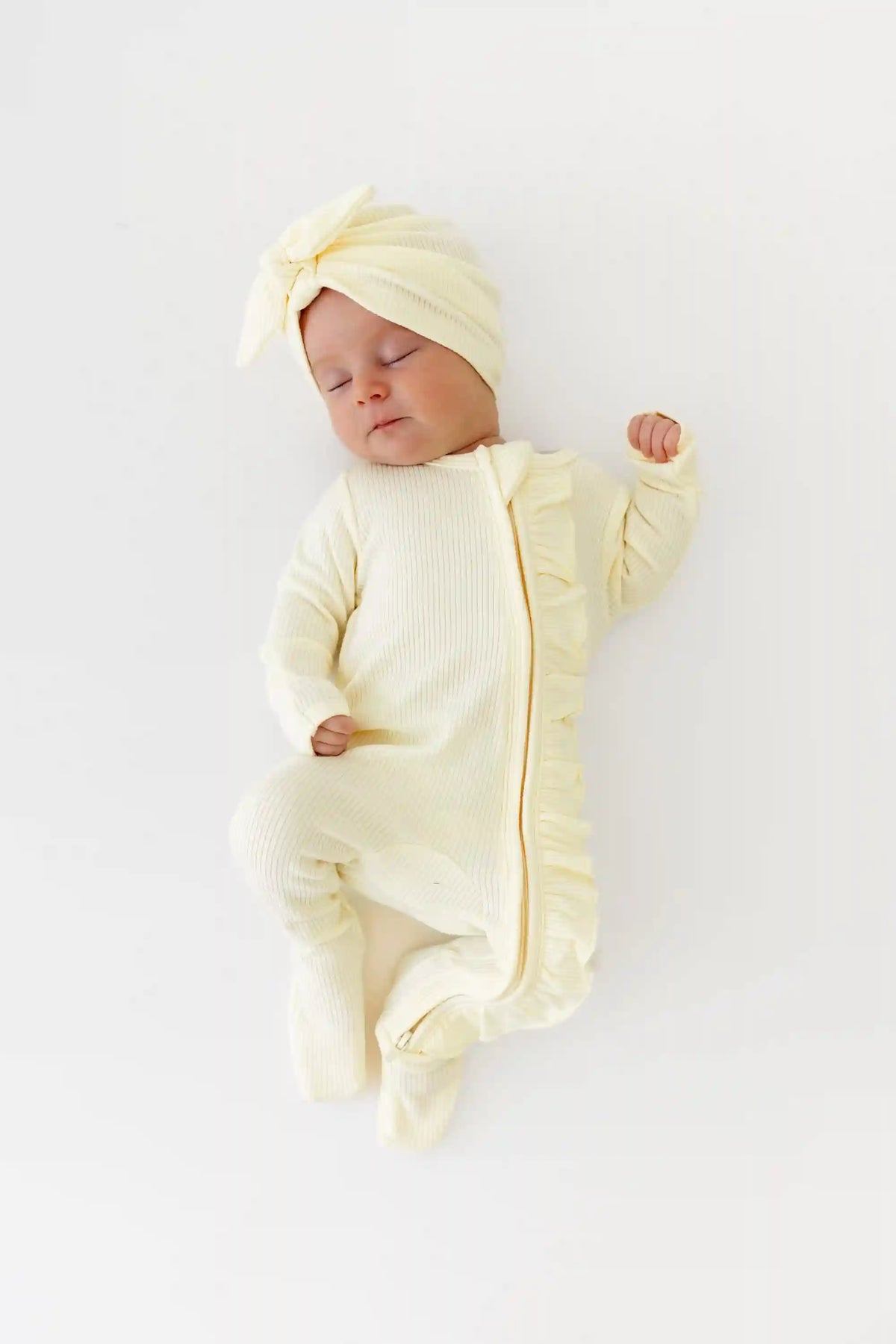 Ribbed Ruffle Zipper Footie in Chamomile